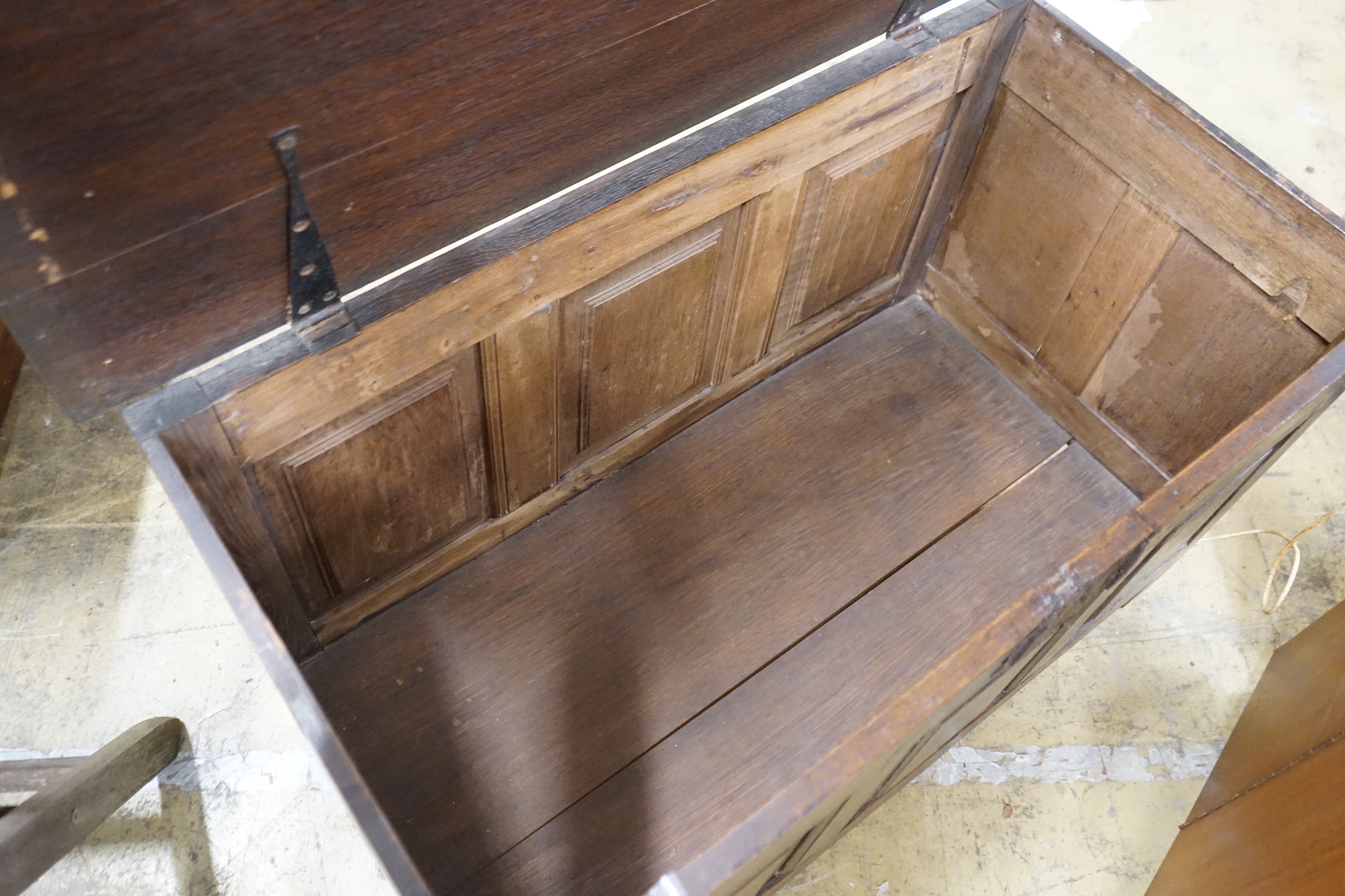 An 18th century style panelled oak coffer, length 107cm, depth 55cm, height 63cm